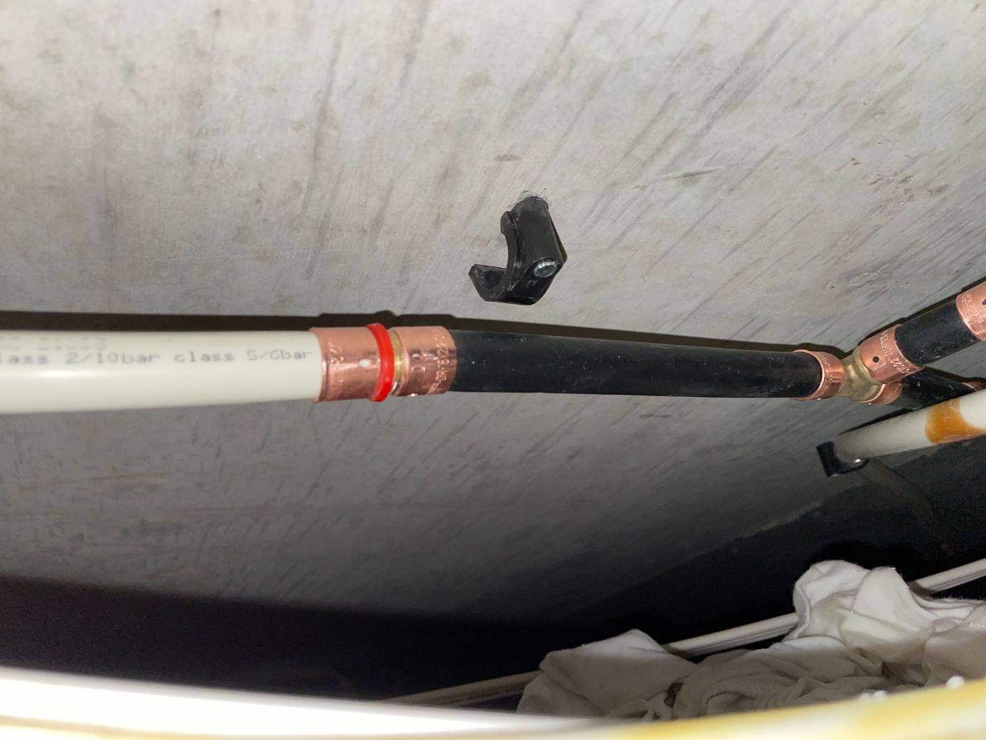 A leaking pipe found behind wall lining